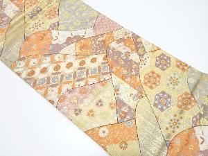 山並に花七宝・笹蔓模様織り出し袋帯